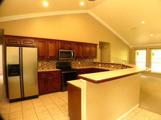 137 Gone Fishin Ln, Mena, AR 71953 - kitchen with appliances with stainless steel finishes, vaulted ceiling, backsplash, a peninsula, and light tile patterned floors