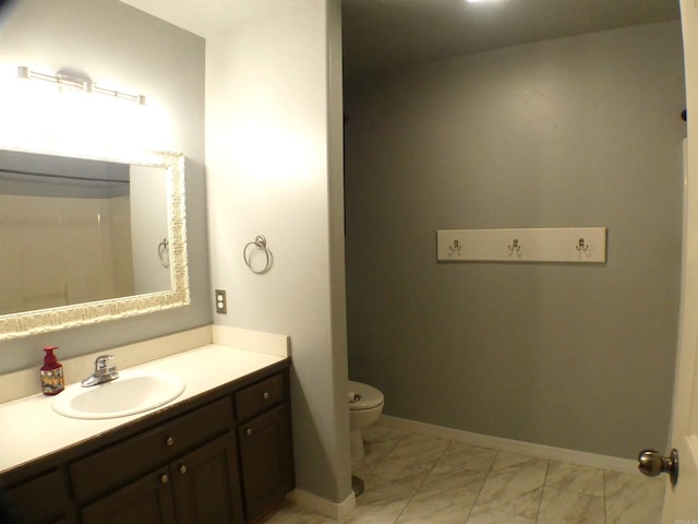 137 Gone Fishin Ln, Mena, AR 71953 - full bath featuring marble look tile flooring, vanity, toilet, and baseboards