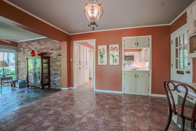 5 Southern Pines Cv, Pine Bluff, AR 71603 - foyer featuring ornamental molding, baseboards, and a ceiling fan