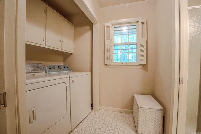 5 Southern Pines Cv, Pine Bluff, AR 71603 - laundry room featuring washer and dryer, cabinet space, and baseboards