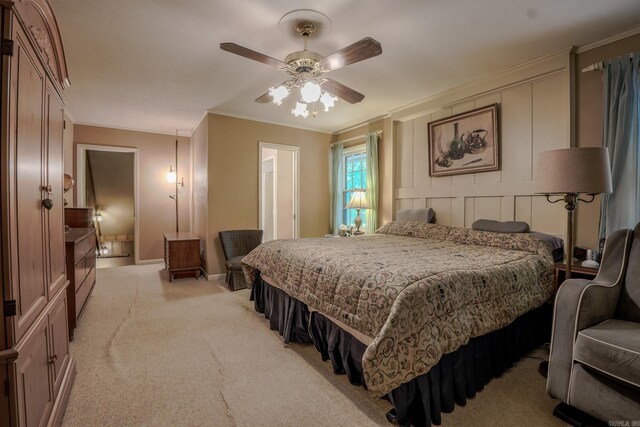 5 Southern Pines Cv, Pine Bluff, AR 71603 - bedroom with light colored carpet, crown molding, baseboards, and a ceiling fan