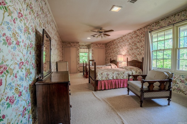5 Southern Pines Cv, Pine Bluff, AR 71603 - bedroom with light colored carpet, a ceiling fan, and wallpapered walls