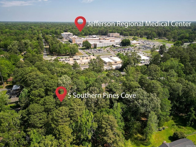 5 Southern Pines Cv, Pine Bluff, AR 71603 - drone / aerial view featuring a forest view