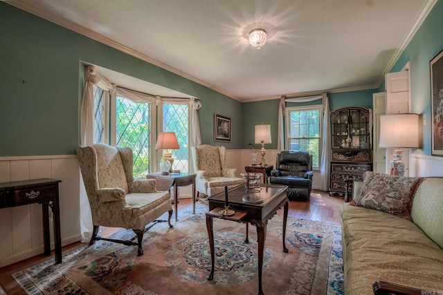 5 Southern Pines Cv, Pine Bluff, AR 71603 - living area with a wainscoted wall, wood finished floors, and ornamental molding