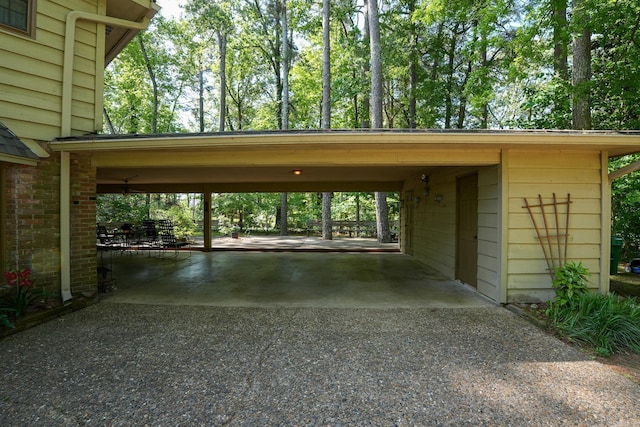 5 Southern Pines Cv, Pine Bluff, AR 71603 - view of parking / parking lot with an attached carport and gravel driveway