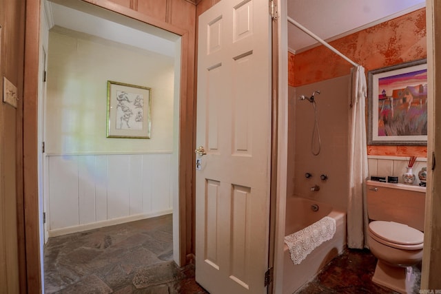 5 Southern Pines Cv, Pine Bluff, AR 71603 - bathroom with a wainscoted wall, toilet, shower / bath combination with curtain, and stone finish flooring