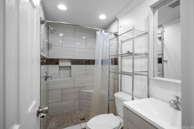 1504 W Woodson Lateral Rd, Hensley, AR 72065 - bathroom with recessed lighting, toilet, visible vents, a tile shower, and vanity