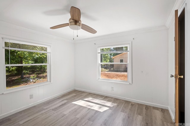 1504 W Woodson Lateral Rd, Hensley, AR 72065 - unfurnished room with baseboards, ornamental molding, ceiling fan, and light wood-style floors