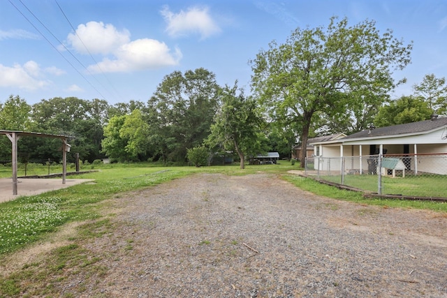 view of road with driveway