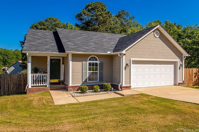 view of front facade featuring covered porch, an attached garage, fence, a front yard, and driveway