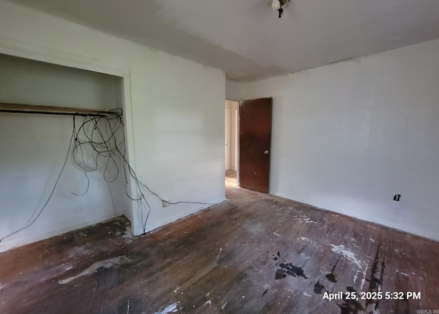 unfurnished bedroom with wood finished floors