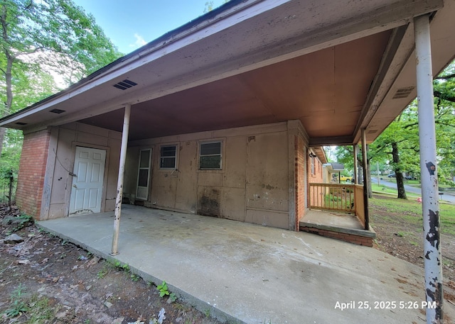 exterior space featuring an attached carport