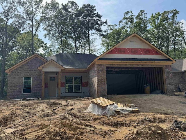 3213 Galloway Dr, Benton, AR 72015 - property in mid-construction featuring dirt driveway, brick siding, and a garage