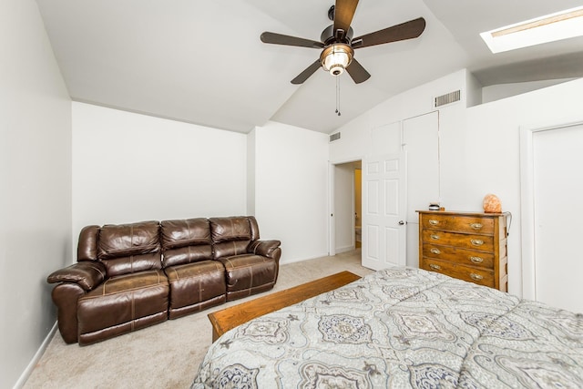2420 Marshall St, Little Rock, AR 72206 - carpeted bedroom featuring baseboards, visible vents, and vaulted ceiling with skylight