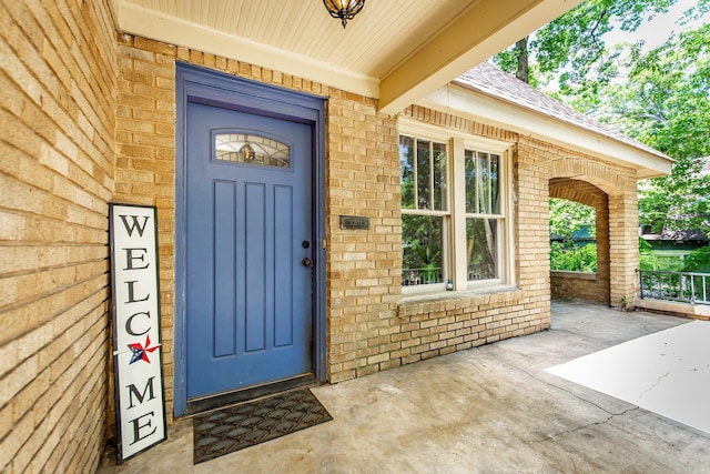 2420 Marshall St, Little Rock, AR 72206 - entrance to property featuring brick siding and roof with shingles