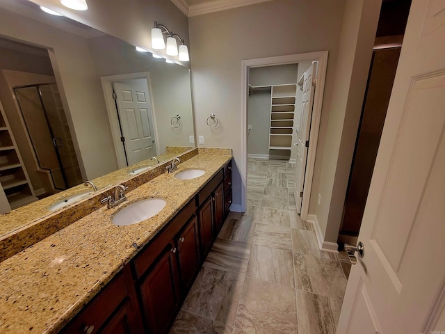 244 Mountain Terrace Cir, Maumelle, AR 72113 - full bath featuring ornamental molding, a stall shower, baseboards, a walk in closet, and double vanity