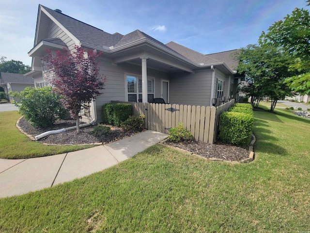 244 Mountain Terrace Cir, Maumelle, AR 72113 - view of front of property featuring a front lawn, roof with shingles, fence, and a gate