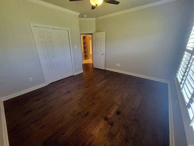 244 Mountain Terrace Cir, Maumelle, AR 72113 - unfurnished bedroom featuring dark wood finished floors, baseboards, crown molding, a closet, and a ceiling fan