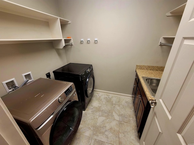 244 Mountain Terrace Cir, Maumelle, AR 72113 - clothes washing area with washing machine and dryer, baseboards, and cabinet space