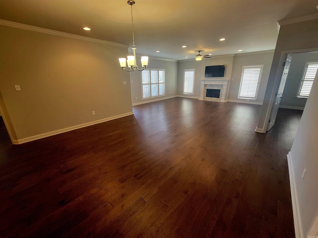 244 Mountain Terrace Cir, Maumelle, AR 72113 - unfurnished living room with crown molding, baseboards, ceiling fan, a fireplace, and a chandelier