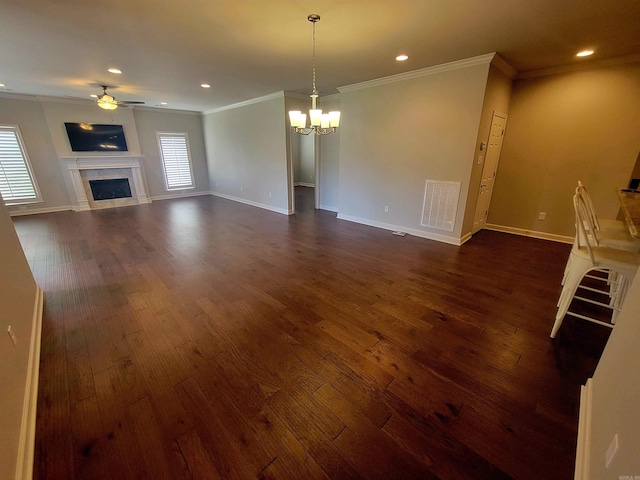 244 Mountain Terrace Cir, Maumelle, AR 72113 - unfurnished living room with ornamental molding, a ceiling fan, a high end fireplace, a chandelier, and dark wood finished floors