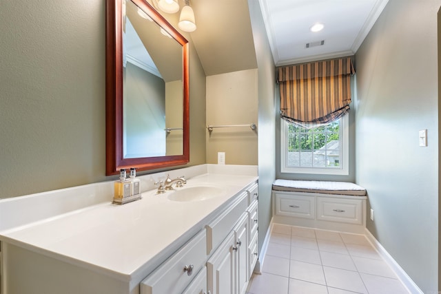 bathroom with tile patterned flooring, crown molding, vanity, and visible vents