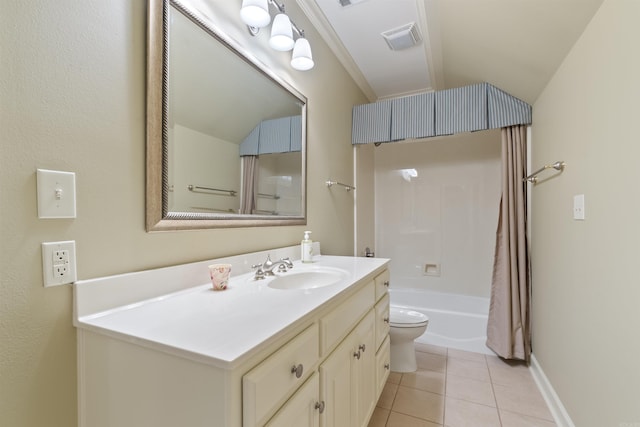 bathroom featuring toilet, vanity, visible vents, tile patterned floors, and baseboards