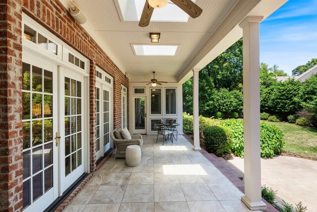 view of patio / terrace featuring french doors and ceiling fan