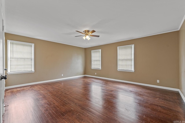 720 N 18th St, Blytheville, AR 72315 - empty room featuring ceiling fan, ornamental molding, baseboards, and dark wood-style floors