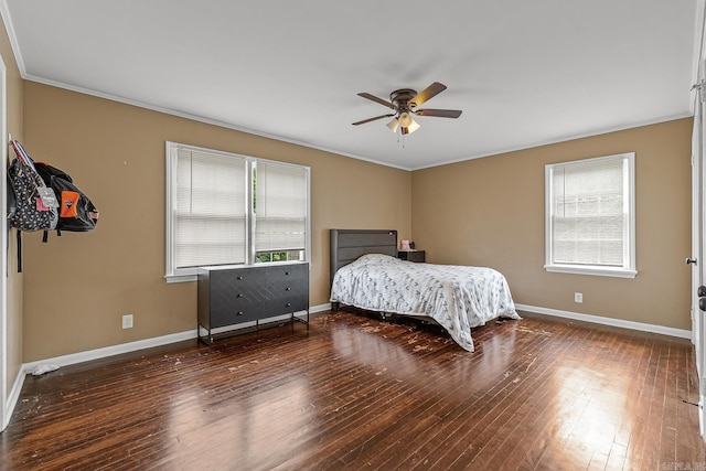720 N 18th St, Blytheville, AR 72315 - bedroom featuring baseboards, crown molding, wood-type flooring, and a ceiling fan