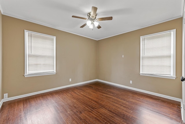 720 N 18th St, Blytheville, AR 72315 - empty room with baseboards, crown molding, ceiling fan, and dark wood-type flooring