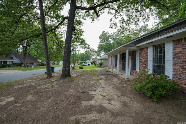 view of yard with a residential view
