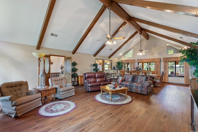 1000 Grandview Heights Dr, Conway, AR 72032 - living room featuring high vaulted ceiling, a ceiling fan, wood finished floors, and beam ceiling