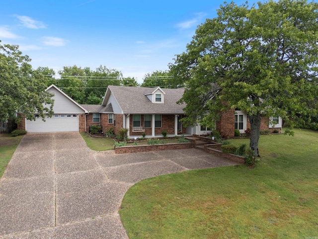 1000 Grandview Heights Dr, Conway, AR 72032 - cape cod house with brick siding, driveway, a front yard, an attached garage, and a porch