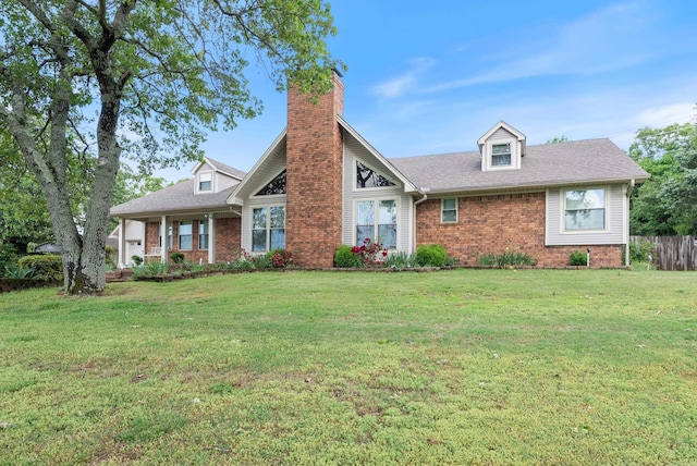 1000 Grandview Heights Dr, Conway, AR 72032 - view of front of home with brick siding, a chimney, and roof with shingles