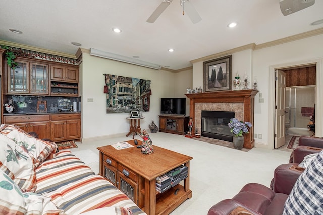 12 Loyola Ln, Hot Springs Village, AR 71909 - living area featuring crown molding, ceiling fan, a premium fireplace, recessed lighting, and light colored carpet