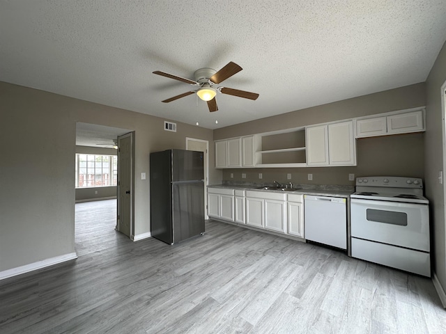 1720 Sanford Dr, Little Rock, AR 72227 - kitchen featuring white appliances, a ceiling fan, open shelves, light wood-type flooring, and white cabinets