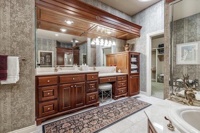 5 Granada Ln, Hot Springs Village, AR 71909 - bathroom with vanity, wallpapered walls, and a walk in closet