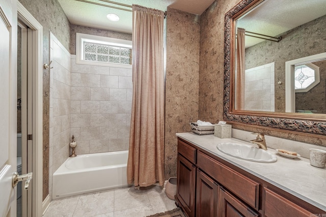 5 Granada Ln, Hot Springs Village, AR 71909 - full bathroom featuring shower / tub combo with curtain, vanity, a textured ceiling, tile patterned floors, and wallpapered walls