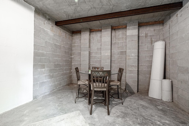 5 Granada Ln, Hot Springs Village, AR 71909 - dining space featuring concrete flooring and concrete block wall