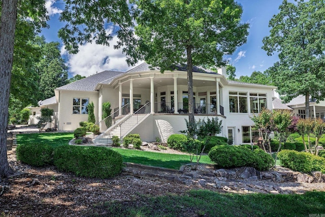 5 Granada Ln, Hot Springs Village, AR 71909 - back of house with stairs, a chimney, covered porch, stucco siding, and roof with shingles