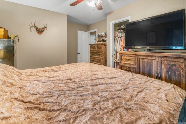 718 Jones St, Sheridan, AR 72150 - bedroom featuring a spacious closet, a closet, and ceiling fan