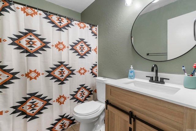 718 Jones St, Sheridan, AR 72150 - bathroom with a textured wall, toilet, vanity, and a shower with curtain