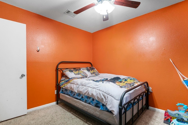 718 Jones St, Sheridan, AR 72150 - bedroom with carpet floors, a ceiling fan, and baseboards