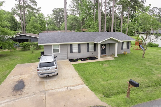 718 Jones St, Sheridan, AR 72150 - ranch-style home featuring a front lawn, a shingled roof, and view of scattered trees