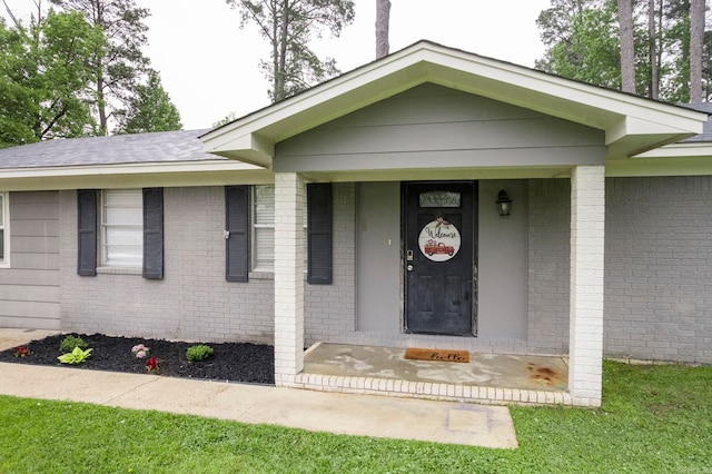 718 Jones St, Sheridan, AR 72150 - doorway to property with brick siding