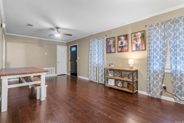718 Jones St, Sheridan, AR 72150 - dining area featuring hardwood / wood-style floors, ceiling fan, baseboards, and crown molding