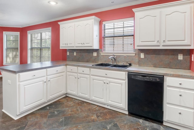 kitchen with black dishwasher, a peninsula, a sink, ornamental molding, and dark stone finish floors