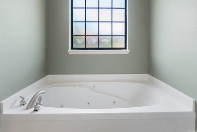 bathroom with a jetted tub