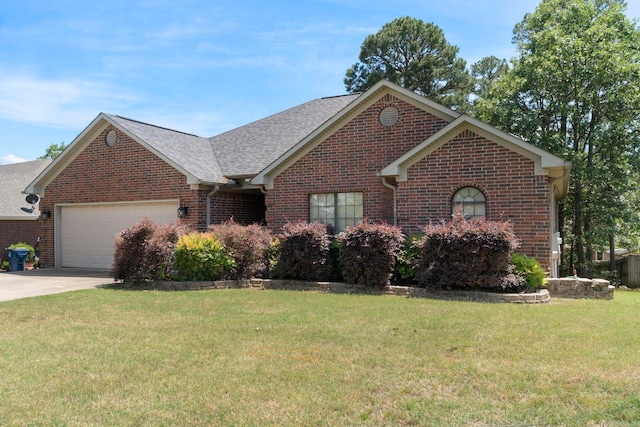 single story home featuring brick siding, an attached garage, driveway, and a front yard